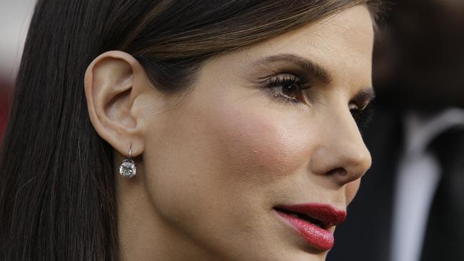 Sandra Bullock found out her husband was cheating, so she filed for divorce and then adopted a baby boy, Louis Bardo. Picture: AP Photo/Amy Sancetta, File