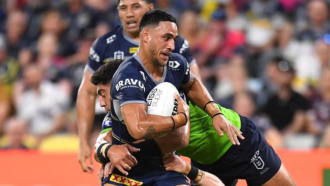 Valentine Holmes of the Cowboys is tackled during the round two NRL match between the North Queensland Cowboys and the Canberra Raiders at Qld Country Bank Stadium, on March 19, 2022, in Townsville, Australia. (Photo by Albert Perez/Getty Images)