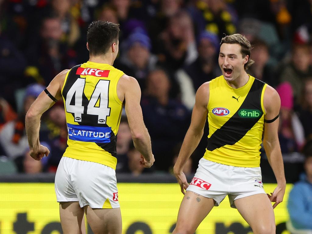 Seth Campbell of the Tigers celebrates a goal with Tyler Sonsie. (Photo by Sarah Reed/AFL Photos via Getty Images)