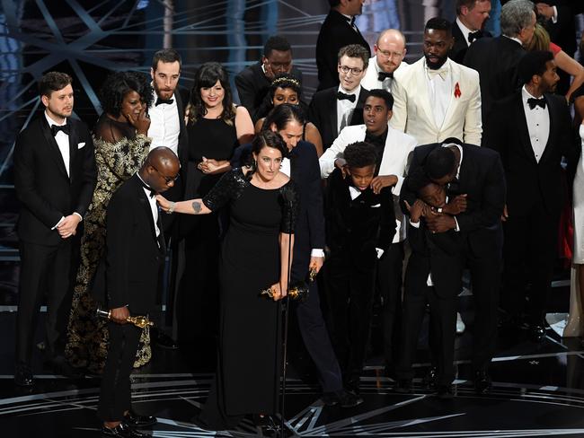 Cast and crew of Moonlight accept the Best Picture award onstage after an unfortunate gaffe led to the wrong winner being announced. Picture: Getty Images