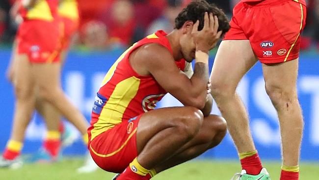 Gold Coast Suns players after a loss.