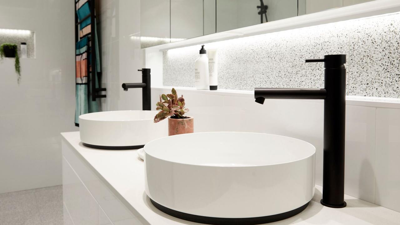 They went for an elegant look with circular basins and black taps. Source: The Block