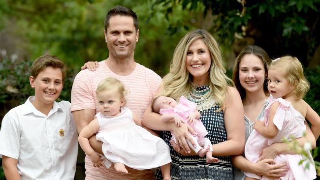 1/3/16 - Gavin Wanganeen's wife Pippa gave birth to their third child together, baby girl Posey, 1.5 weeks ago. Gavin and Pippa are pictured at their Beaumont home with their daughters Kitty, 2, Lulu, 14 months and newborn Posey and Gavin's children Tex, 12 and Mia, 15 from a previous marriage. Photo Naomi Jellicoe