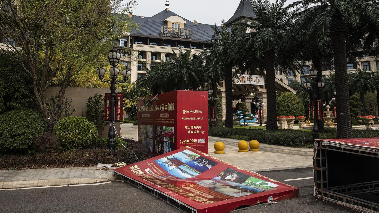 Billboards blown down by the wind in Evergrande Wuhan culture-oriented travel city. Picture: Getty Images