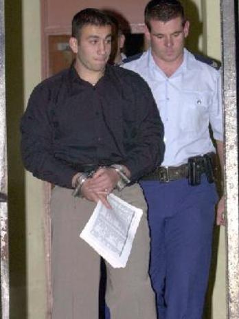 Hamzy is returned to Australia after his arrest in 1998