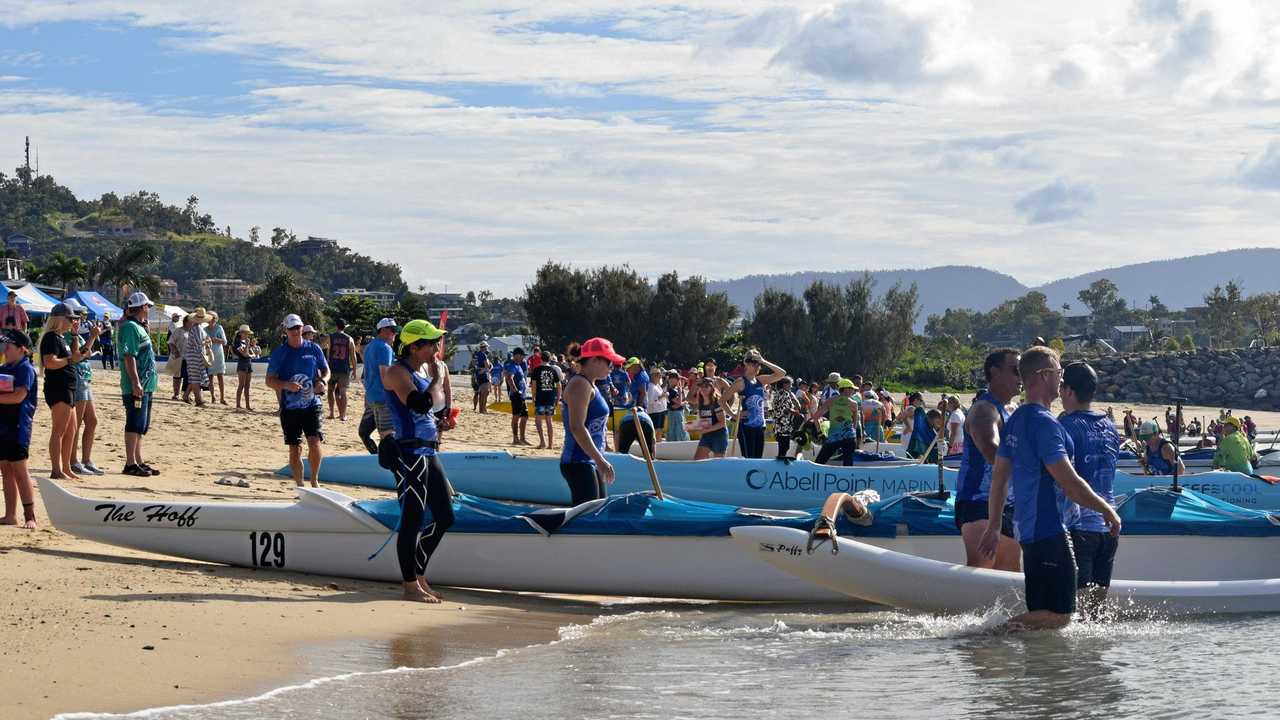 Outriggers hit Airlie waters | The Courier Mail