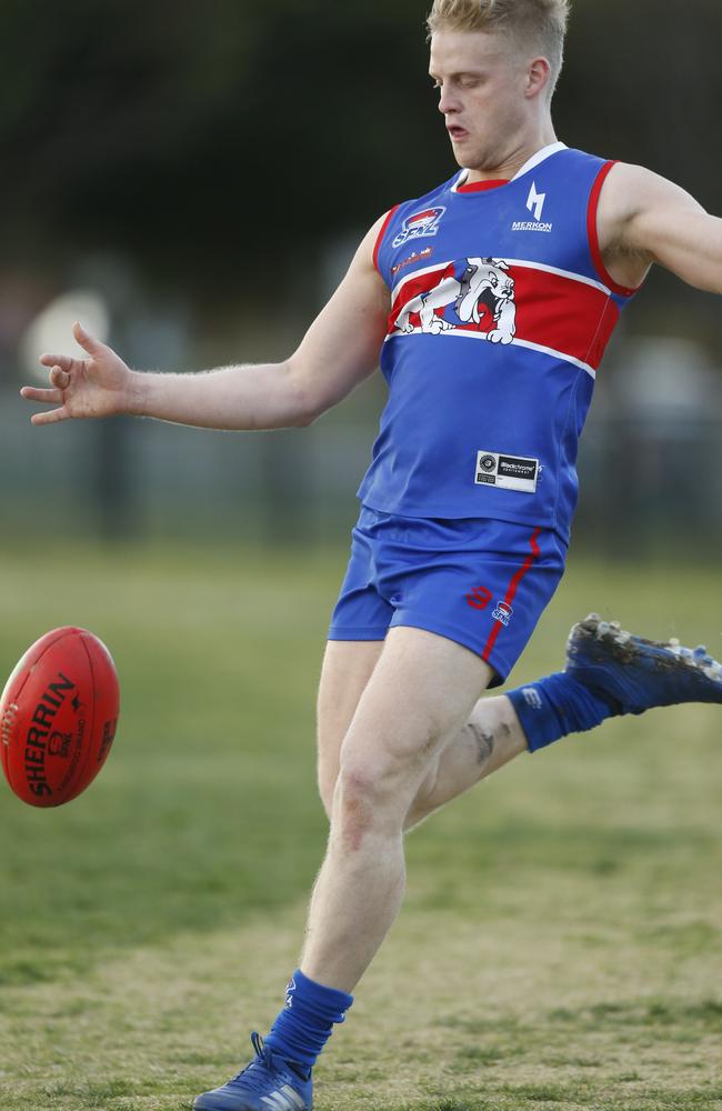 Ryan Carroll takes a kick for St Paul's.