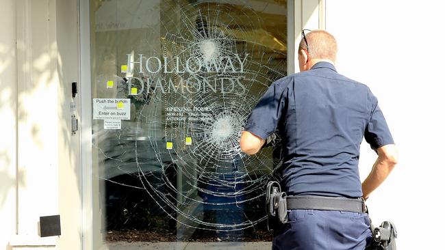 Three youths armed with a sledgehammer have tried to smash their way into a Brighton jewellery store. Picture: Mark Stewart