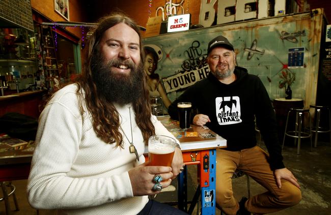 Young Henrys founders Oscar McMahon and Richard Adamson in the bar room of their Newtown brewery. Young Henrys has grown from a small beer club into a massive business. Picture: John Appleyard