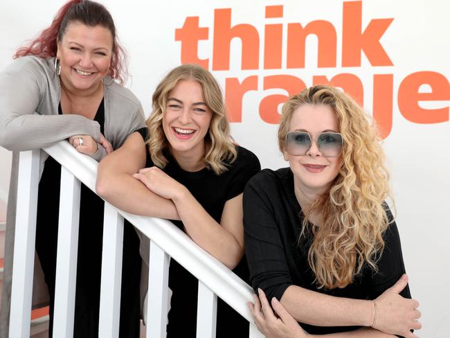 Melinda Parent,(R), the founder of all-female advertising agency, OranjeCreative, is mentoring design student, Elly Adamson, (C),and along with graphic designer Kirstie Wyatt, business is looking up. 25 March 2022. Picture Dean Martin