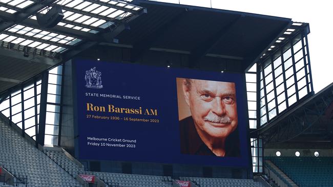 The big screen is seen during the Ron Barassi state memorial service. Picture: Michael Willson