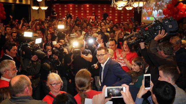 Dan Andrews surrounded by supporters last night. Picture: Alex Coppel