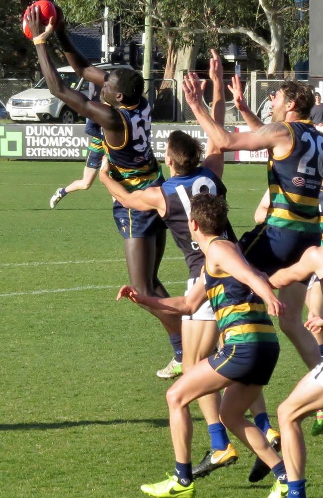 Tom Jok marks for St Kevin’s in the VAFA.