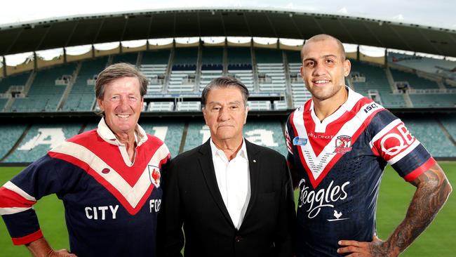 Russell Fairfax with Roosters chairman Nick Politis and Blake Ferguson. Picture: Gregg Porteous