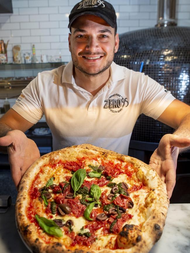 Claudio Garissi with a pizza positano. Picture: Valeriu Campan