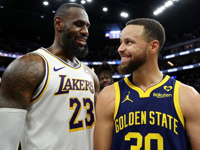 SAN FRANCISCO, CALIFORNIA - JANUARY 27: LeBron James #23 of the Los Angeles Lakers and Stephen Curry #30 of the Golden State Warriors talk to each other after the Lakers beat the Warriors in double overtime at Chase Center on January 27, 2024 in San Francisco, California. NOTE TO USER: User expressly acknowledges and agrees that, by downloading and or using this photograph, User is consenting to the terms and conditions of the Getty Images License Agreement.  (Photo by Ezra Shaw/Getty Images)