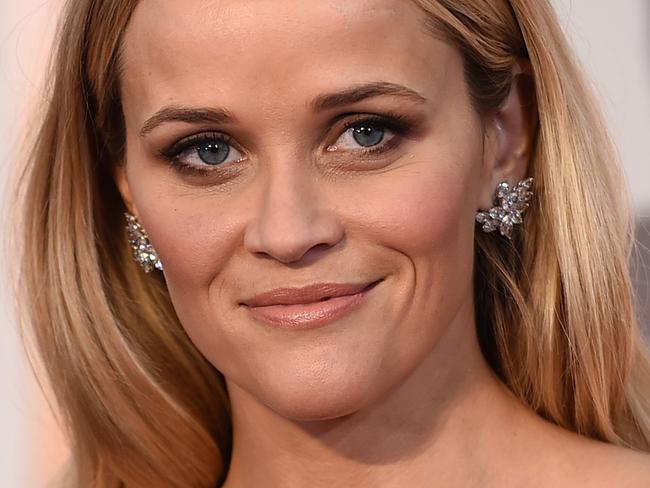 FILE - In this Feb. 22, 2015 file photo, Reese Witherspoon arrives at the Oscars at the Dolby Theatre in Los Angeles. Witherspoon has launched her own lifestyle brand. The Oscar-winning actress unveiled her Draper James online store Wednesday, May 6, 2015, which includes women’s clothing and accessories, stationery and home decor. (Photo by Jordan Strauss/Invision/AP, File)