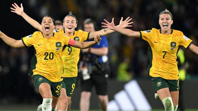 BRISBANE, AUSTRALIA - AUGUST 12: Sam Kerr, Caitlin Foord and Steph Catley of Australia celebrate the teamÃ¢â¬â¢s victory through the penalty shoot out following the FIFA Women's World Cup Australia & New Zealand 2023 Quarter Final match between Australia and France at Brisbane Stadium on August 12, 2023 in Brisbane, Australia. (Photo by Quinn Rooney/Getty Images )