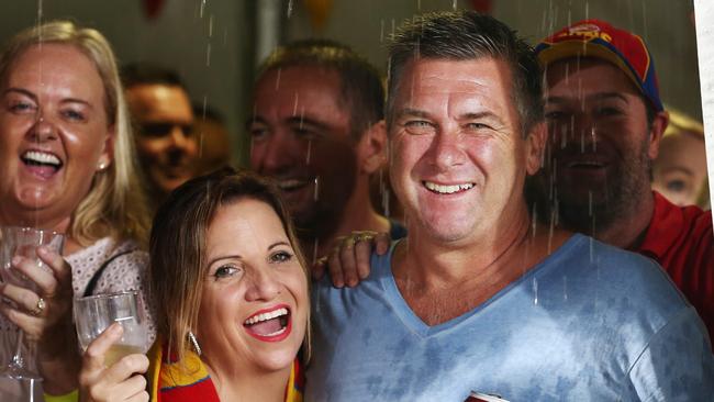 Trevor and Mia Lovett enjoyed the AFL match between the Gold Coast Suns and the North Melbourne Kangaroos at Cazalys Stadium under the cover of a corporate are. PICTURE: BRENDAN RADKE.