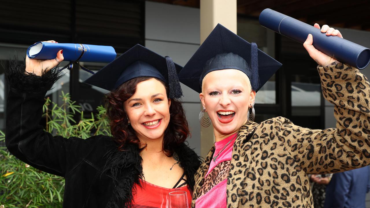 Deakin graduates Kailah Rodger and Jude Stewart-Kimber. Picture: Alison Wynd