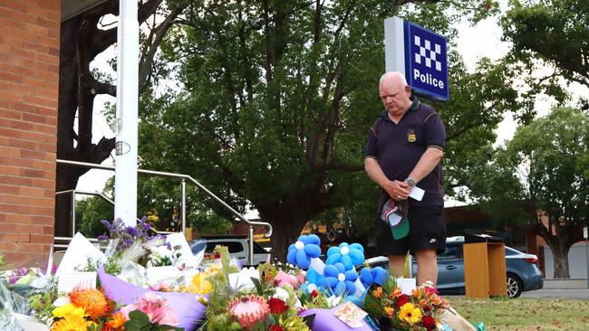 Residents of Chinchilla continue to leave flowers and gifts at the local Police station as they come to terms with such tragedy. Picture David Clark NCA/Newswire