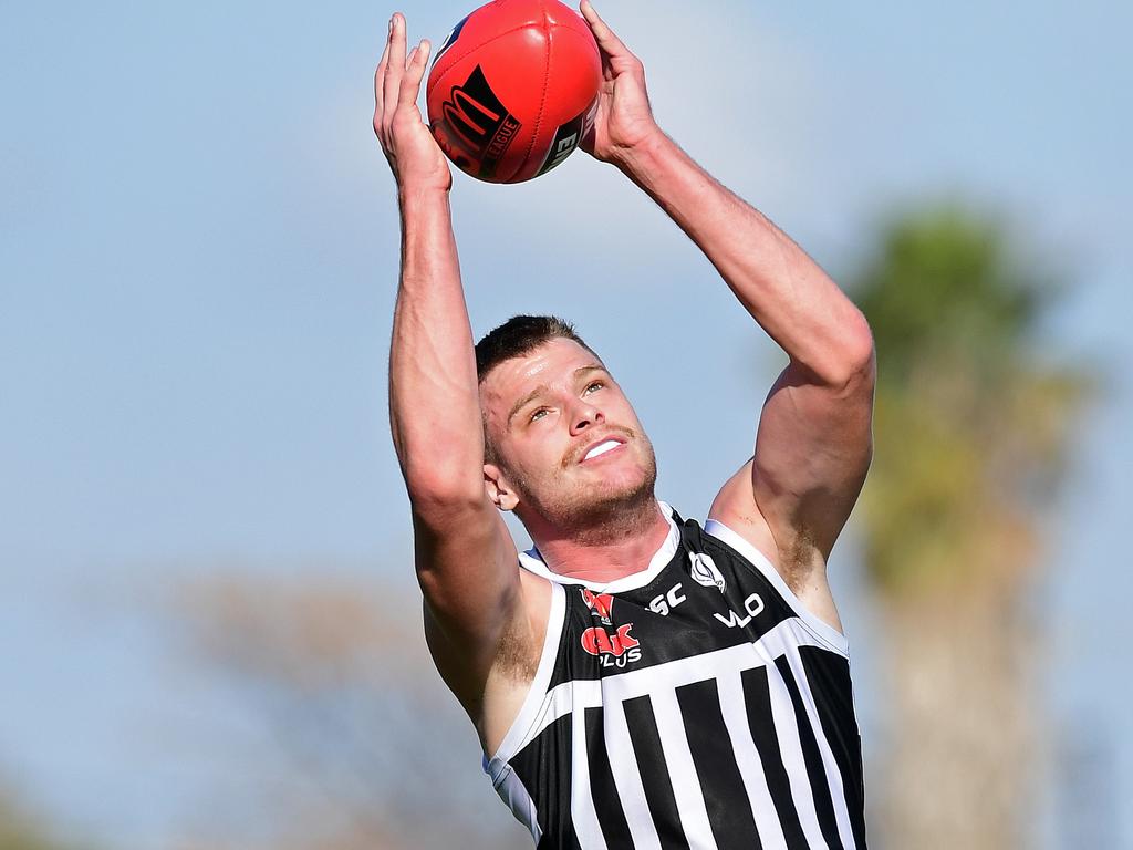 28/07/18 - SANFL: Port Adelaide v South Adelaide at Alberton Oval.  Port's Peter Ladhams takes a mark.Picture: Tom Huntley