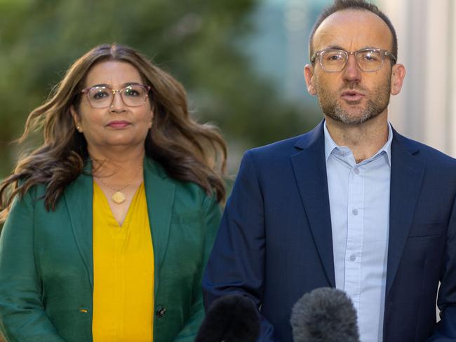 CANBERRA, AUSTRALIA - NewsWire Photos MARCH 7, 2023: Adam Bandt, Leader of the Australian Greens with Senator Mehreen Faruqi, Deputy Leader of the Australian Greens in Parliament House in Canberra.Picture: NCA NewsWire / Gary Ramage