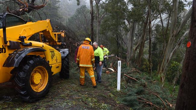 Clearing a landslide on Fernhurst Road, Cherryville. Picture: Roger Wyman