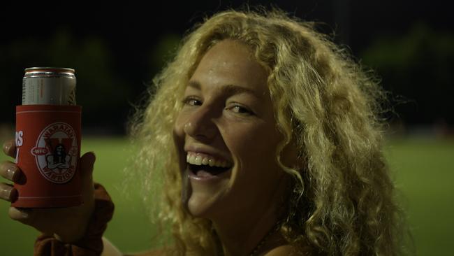 Nadia enjoying a cold one at the opening game of the NTFL 22/23 season. Picture: Beth