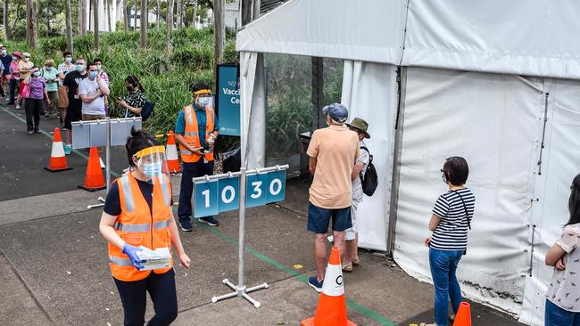 People are seen queued to receive their vaccination at the NSW Vaccine Centre. Picture: NCA NewsWire / Flavio Brancaleone