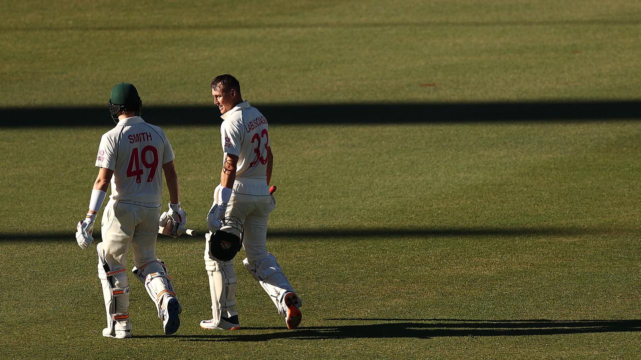 Steve Smith and Marnus Labuschagne of Australia walk from the ground at stumps