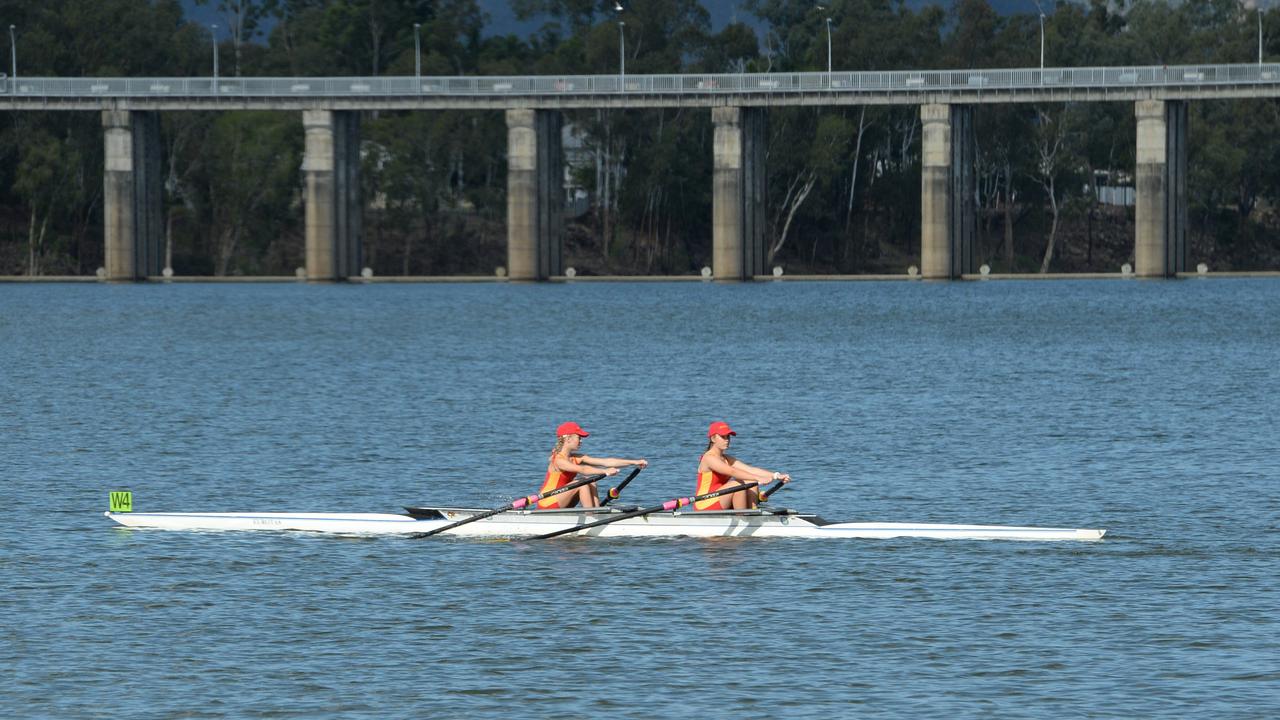 A pair of Stuartholme School rowers head out on to the course during the Queensland Secondary Schools Rowing Championships in Rockhampton.