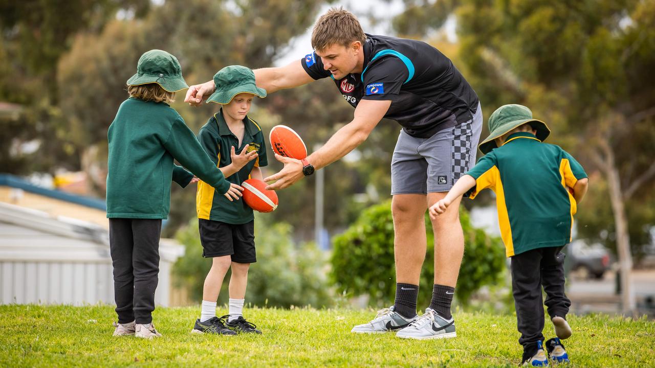 Wines also kicked the footy with some of the students. Picture: Tom Huntley