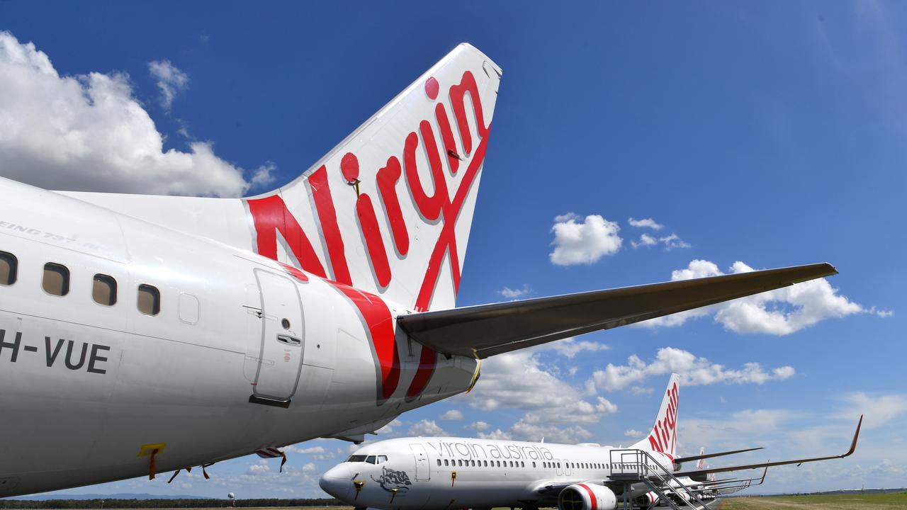 Grounded Virgin aircraft parked at Brisbane Airport. Picture: Darren England/AAP