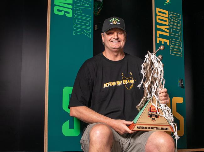 Tasmania JackJumpers Head Coach Scott Roth with the NBL trophy. Picture: Linda Higginson