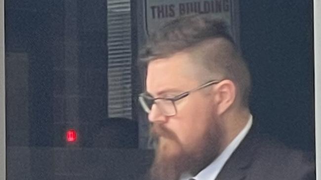 Former Senior Constable Andrew Martin, 28, of Hamlyn Terrace, leaving Wyong Local Court where he pleaded guilty to assault and intimidation. Picture: NewsLocal