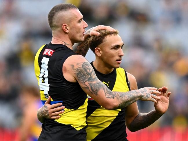 MELBOURNE, AUSTRALIA - MAY 06: Shai Bolton of the Tigers is congratulated by Dustin Martin after kicking a goal during the round eight AFL match between Richmond Tigers and West Coast Eagles at Melbourne Cricket Ground, on May 06, 2023, in Melbourne, Australia. (Photo by Quinn Rooney/Getty Images)