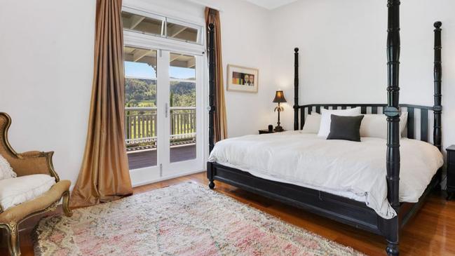 One of the impressive bedrooms, which has French doors onto the wraparound veranda.