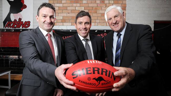 AFL Tasmania CEO Rob Auld and former Tasmanian AFL legends and board members, Matthew Richardson and Peter Hudson. Picture: LUKE BOWDEN