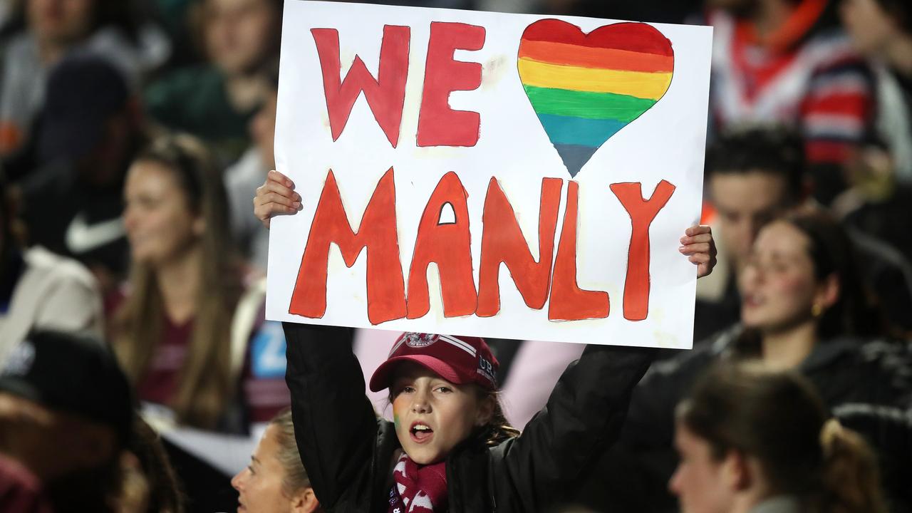 A Manly fan shows support for the Pride jersey match.