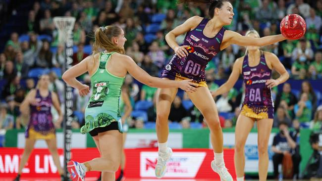 Ruby Bakewell-Doran of the Firebirds reaches out to intercept the ball during the round 12 Super Netball match between West Coast Fever and Queensland Firebirds. Photo: Getty Images