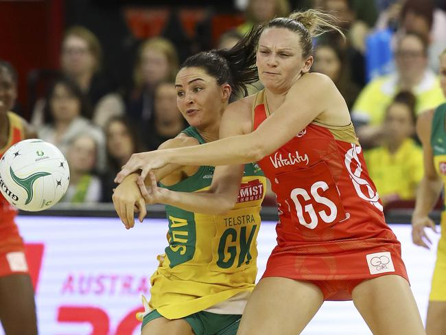 Australia’s Sharni Layton and England’s Jo Harten battle it out. Picture: Sarah Reed