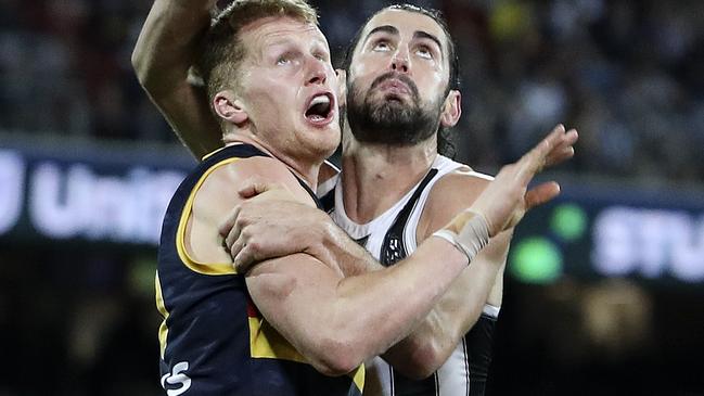 Brodie Grundy contests the ruck against Adelaide’s Reilly O’Brien. Picture: Sarah Reed.