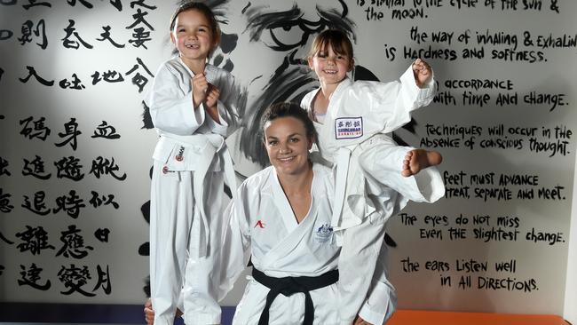 SA’s Tokyo Olympics karate contender Michelle Wilson, with her six-year-old twin daughters Layla and Ryleigh. Picture: Tom Huntley