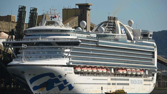 Cruise liner Ruby Princess sits in the harbour in Port Kembla, 80km south of Sydney after coming in to refuel and restock on April 6. Picture: AFP