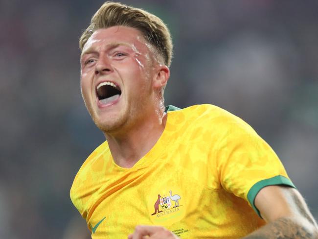 ARLINGTON, TEXAS - SEPTEMBER 9: Harry Souttar #19 of Australia celebrates after scoring the opening goal during the friendly match between Mexico and Australia at AT&T Stadium on September 9, 2023 in Arlington, Texas. (Photo by Omar Vega/Getty Images)