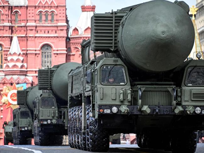 (FILES) Russian Yars intercontinental ballistic missile launchers roll on Red Square during the Victory Day military parade in central Moscow on May 9, 2024. Russian President Vladimir Putin on September 25, 2024 called for changes to rules on the use of Russia's nuclear deterrent, a move that could affect Moscow's approach to the current conflict in Ukraine on September 25, 2024. (Photo by Alexander NEMENOV / AFP)