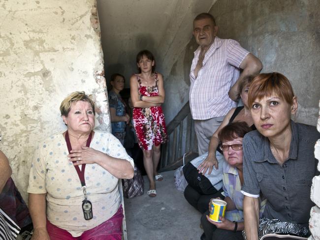 21 July 2014: Sheltering in a bunker under a school with mothers and students amid intense fighting in Donbas. Picture: Ella Pellegrini