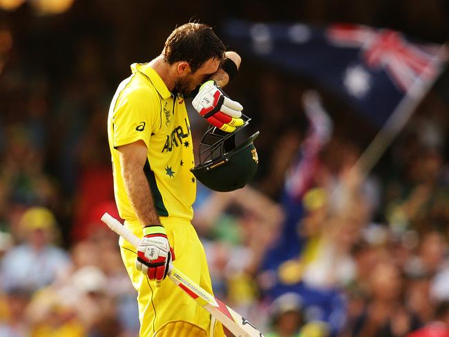 Australia's Glenn Maxwell celebrates his century off 51 balls during the 2015 ICC Cricket World Cup cricket match between Australia and Sri Lanka at the SCG. Pic Brett Costello