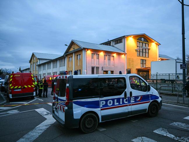 Firefighter and police vehicles near the site of a knife attack in Mulhouse, eastern France. Picture: AFP